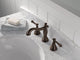 Delta Cassidy Widespread Bathroom with Metal Pop-Up