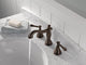 Delta Cassidy Widespread Bathroom with Metal Pop-Up